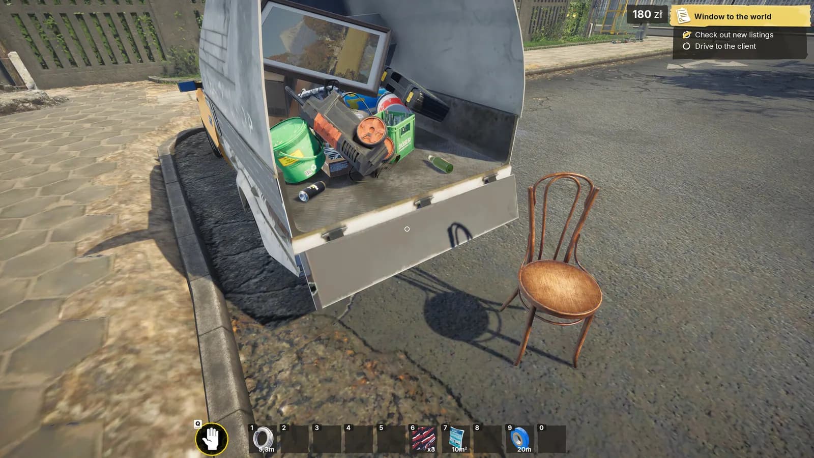 Low-Budget Repairs work truck with repair tools and materials visible in its open cargo bed